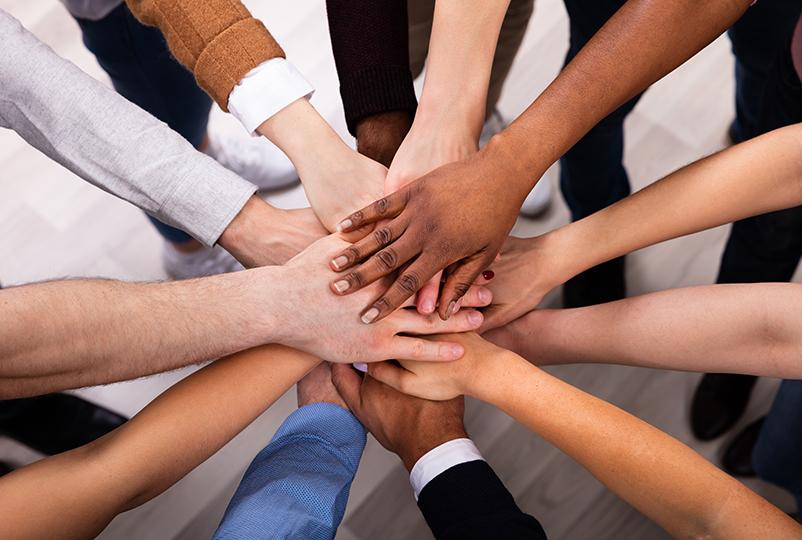 diverse hands all in
