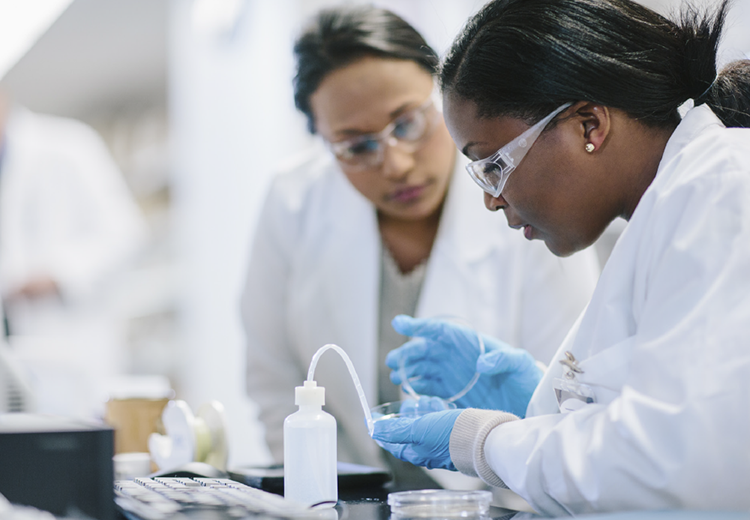 Two medical people working in a lab together