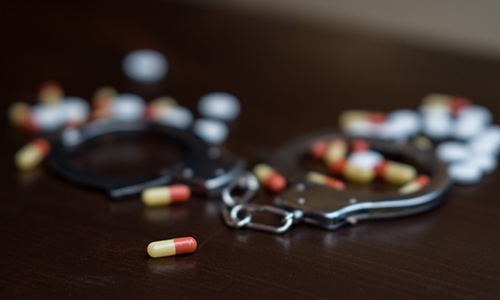 Image depicting an opioid takedown