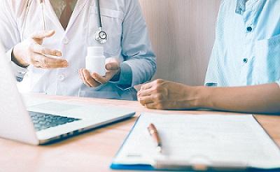 Doctor talking to patient